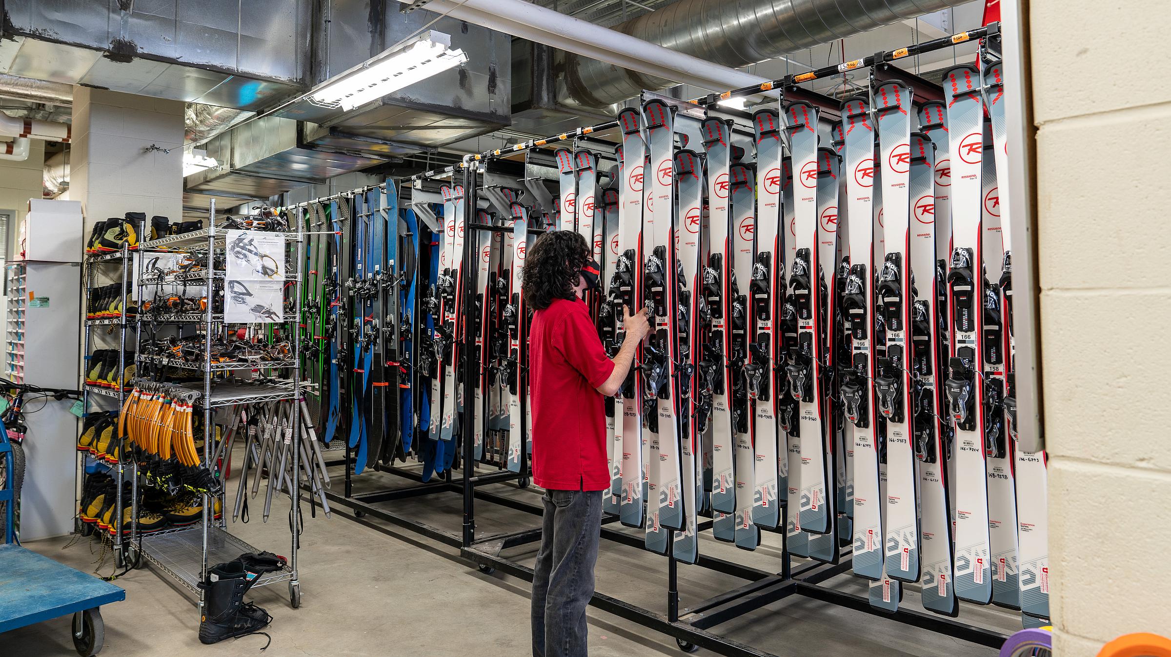 Employee renting skis